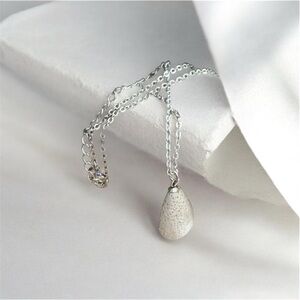 Vintage Avon White Porous Stone Pendant Necklace Silver Tone 22” NIB